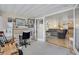 Sunroom with home office and view into living room at 716 Blackburn Blvd, North Port, FL 34287