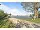 Golf cart path alongside the waterfront at 716 Blackburn Blvd, North Port, FL 34287
