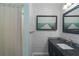 Charming bathroom with updated vanity and beach-themed decor at 8006 Oak Dr, Palmetto, FL 34221