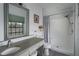 Modern bathroom with updated vanity, shower, and stylish decor at 8006 Oak Dr, Palmetto, FL 34221