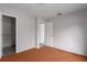 Bedroom with large closet, brown carpet and neutral walls at 8006 Oak Dr, Palmetto, FL 34221