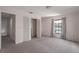 Well-lit bedroom featuring a large closet and neutral carpet at 8006 Oak Dr, Palmetto, FL 34221
