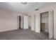 Spacious bedroom with ample closet space and neutral carpeting at 8006 Oak Dr, Palmetto, FL 34221