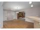 View from kitchen to dining room with hardwood floors at 8006 Oak Dr, Palmetto, FL 34221