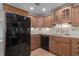 Kitchen with black appliances and ample counter space at 8006 Oak Dr, Palmetto, FL 34221