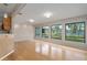 Living room with hardwood floors and large windows at 8006 Oak Dr, Palmetto, FL 34221