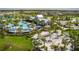 Community pool and amenity area with lounge seating at 8684 Canyon Creek Trl, Parrish, FL 34219