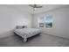 Spacious bedroom with window and carpeted floor at 8684 Canyon Creek Trl, Parrish, FL 34219
