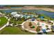Aerial view of community amenities including pool and playground at 8684 Canyon Creek Trl, Parrish, FL 34219