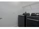 Bright laundry room with LG washer and dryer at 8684 Canyon Creek Trl, Parrish, FL 34219