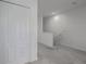 Spacious loft area with carpeted floor and storage at 8684 Canyon Creek Trl, Parrish, FL 34219