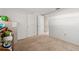 Simple bedroom with carpeted floors and ample closet space at 9066 Oneal Ave, New Port Richey, FL 34654