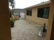 Landscaped backyard with brick pavers and zen garden at 9400 Ridge Rd, Seminole, FL 33772