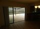 Dining area with pool view and sliding glass doors at 9400 Ridge Rd, Seminole, FL 33772