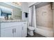 Updated bathroom with granite countertop, tub, and shower at 9481 Highland Oak Dr # 1403, Tampa, FL 33647
