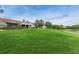 Community clubhouse with expansive lawn at 9481 Highland Oak Dr # 1403, Tampa, FL 33647