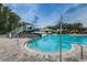 Resort-style pool with waterslide and spacious deck at 9481 Highland Oak Dr # 1403, Tampa, FL 33647