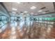 Large dance studio with wood floors and mirrors at 9481 Highland Oak Dr # 1403, Tampa, FL 33647