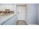 Interior entryway with tile floor and access to kitchen at 9481 Highland Oak Dr # 1403, Tampa, FL 33647