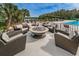 Relaxing fire pit area with comfortable seating at 9481 Highland Oak Dr # 1403, Tampa, FL 33647