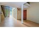 Interior hallway with stairs and entrance to condo unit at 9481 Highland Oak Dr # 1403, Tampa, FL 33647
