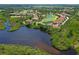 Aerial view of community near water with golf course at 9606 Sea Turtle Ter # 101, Bradenton, FL 34212