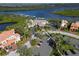 Aerial view of Waterlefe Golf & River Club community, showcasing waterfront homes and resort-style amenities at 9606 Sea Turtle Ter # 101, Bradenton, FL 34212