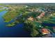 Aerial view of waterfront community with golf course and houses at 9606 Sea Turtle Ter # 101, Bradenton, FL 34212