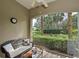 Relaxing screened porch overlooking tranquil water view at 9606 Sea Turtle Ter # 101, Bradenton, FL 34212