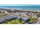 Aerial view of condo community near beach and ocean at 100 The Esplanade N # 1, Venice, FL 34285