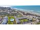Aerial view of community near the beach with pool at 100 The Esplanade N # 1, Venice, FL 34285