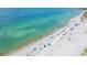 Aerial view of beach with people swimming and relaxing at 100 The Esplanade N # 1, Venice, FL 34285