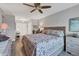 Main bedroom with a king-size bed and plenty of closet space at 100 The Esplanade N # 1, Venice, FL 34285