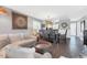 Coastal-styled dining area with wicker chairs and wood table at 100 The Esplanade N # 1, Venice, FL 34285