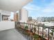 Balcony with city views and metal railings at 101 S Gulfstream Ave # 10E, Sarasota, FL 34236
