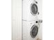 Stackable washer and dryer in convenient laundry room at 101 S Gulfstream Ave # 10E, Sarasota, FL 34236