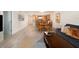 Open living and dining area with hardwood floors and modern furniture at 101 S Gulfstream Ave # 10E, Sarasota, FL 34236