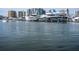 Luxury yachts and boats at a marina with city skyline backdrop at 101 S Gulfstream Ave # 10E, Sarasota, FL 34236