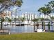 Calm marina with yachts and city skyline in background at 101 S Gulfstream Ave # 10E, Sarasota, FL 34236
