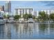 Waterfront marina with yachts and city skyline at 101 S Gulfstream Ave # 10E, Sarasota, FL 34236