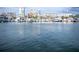 Luxury yachts and boats in a marina with city skyline backdrop at 101 S Gulfstream Ave # 10E, Sarasota, FL 34236