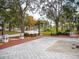 Landscaped park with walking paths, benches, and mature trees at 101 S Gulfstream Ave # 10E, Sarasota, FL 34236