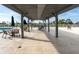 Relaxing rooftop patio with shaded seating near the pool at 101 S Gulfstream Ave # 10E, Sarasota, FL 34236