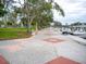 Waterfront walkway with trees, benches, and marina views at 101 S Gulfstream Ave # 10E, Sarasota, FL 34236