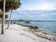 Peaceful waterfront view with boat passing by at 101 S Gulfstream Ave # 10E, Sarasota, FL 34236