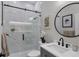 Modern bathroom with marble shower, vessel sink, and stylish decor at 10114 Glenmore Ave, Bradenton, FL 34202