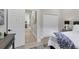 Bedroom with a hallway view and built-in closet at 10114 Glenmore Ave, Bradenton, FL 34202