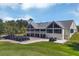 Golf clubhouse with numerous golf carts at 10114 Glenmore Ave, Bradenton, FL 34202