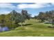 Golf course with pond and lush landscaping at 10114 Glenmore Ave, Bradenton, FL 34202