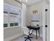 Home office with a desk, chair, and window, offering a view of the outdoors at 10114 Glenmore Ave, Bradenton, FL 34202